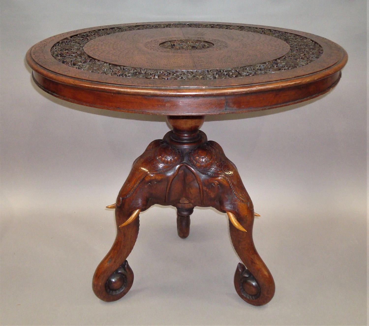 C19th Indian finely carved teak elephant table