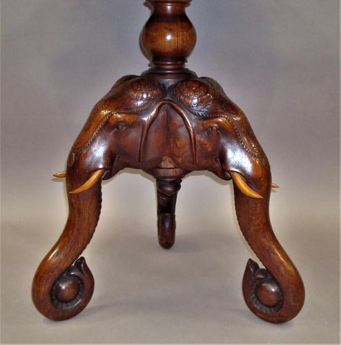 C19th Indian finely carved teak elephant table