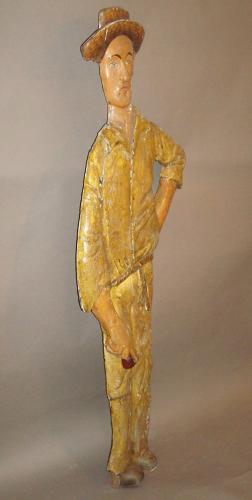 C20th carved wood and painted colonial cricketer