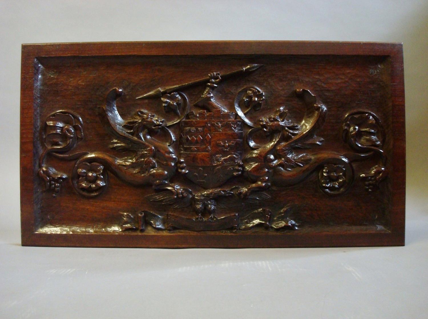 C19th carved walnut armorial panel