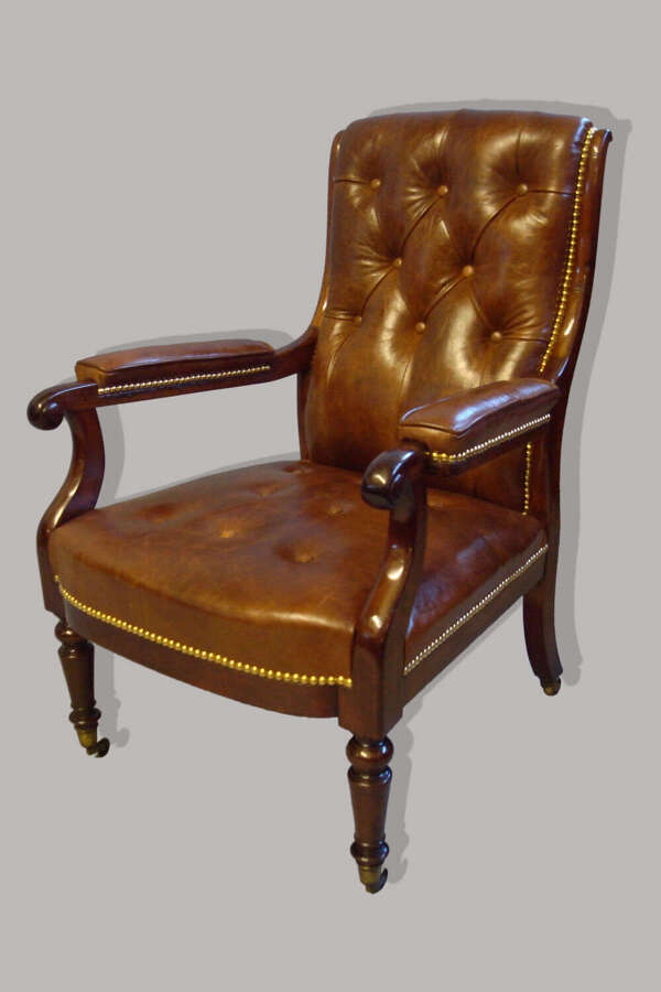 Regency mahogany and leather library open armchair