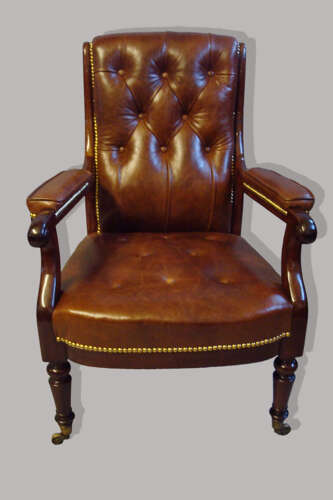 Regency mahogany and leather library open armchair