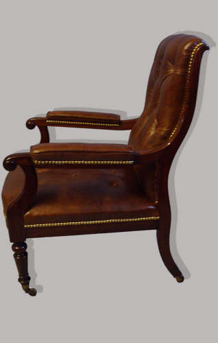 Regency mahogany and leather library open armchair