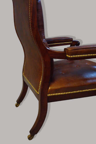 Regency mahogany and leather library open armchair