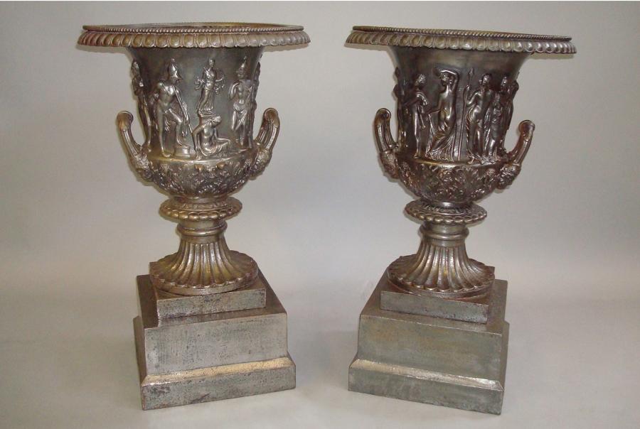 C19th pair of burnished cast iron campanan urns