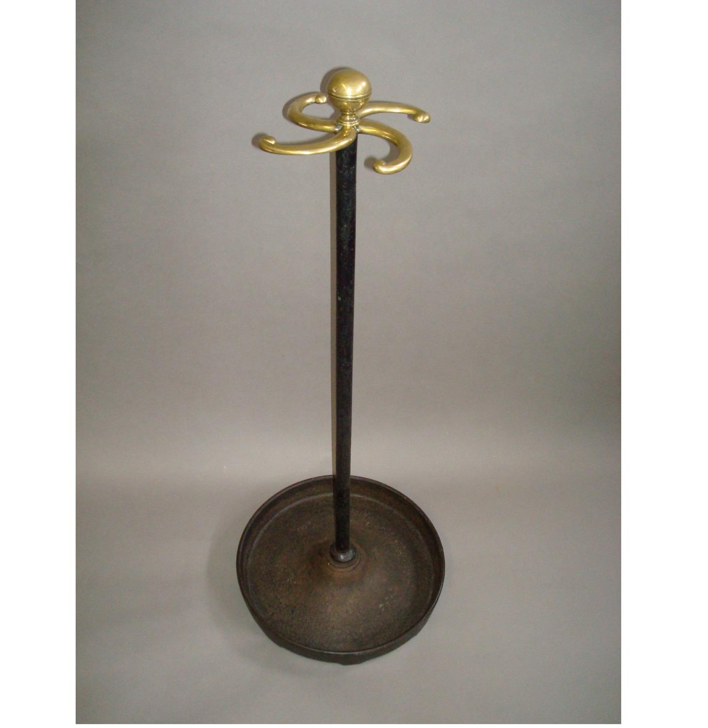 Regency cast iron and brass stick stand