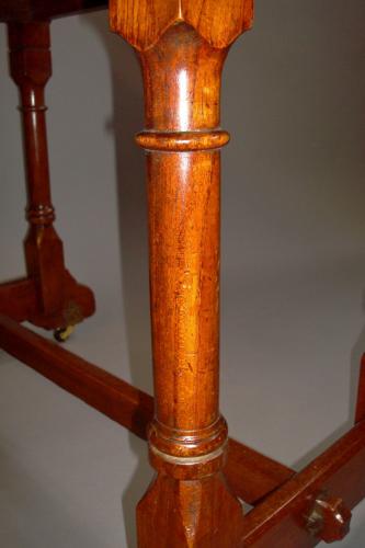 C19th walnut writing table stamped Gillows