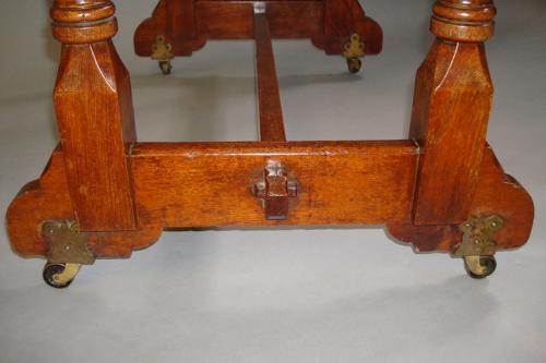 C19th walnut writing table stamped Gillows