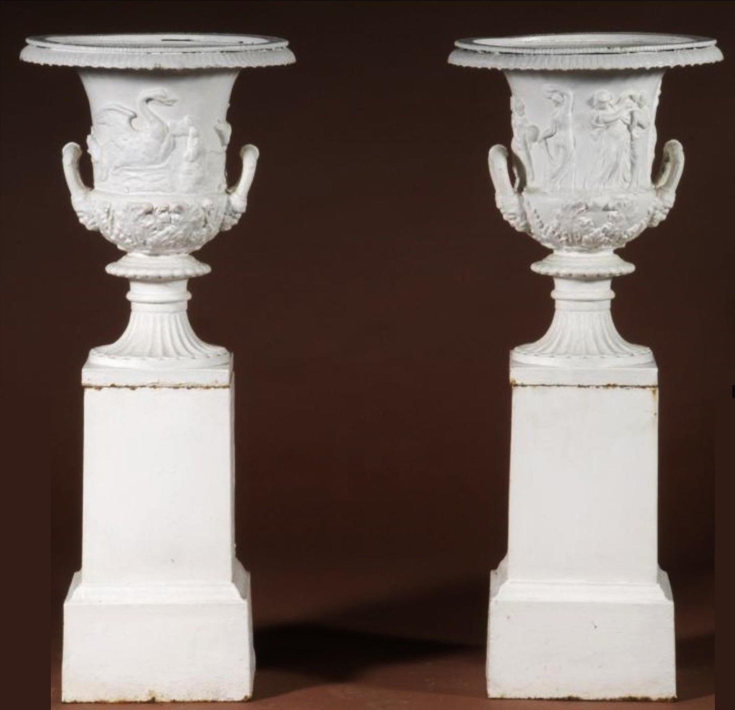 19th century pair of cast iron urns