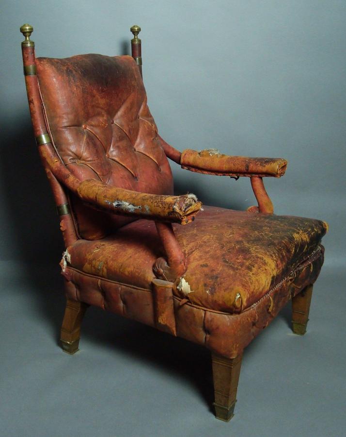 C19th querky mahogany and leather library chair