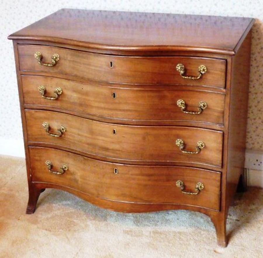 George III mahogany serpentine fronted chest of drawers