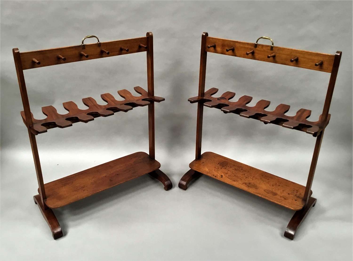 Pair Regency mahogany 'country house' whip and boot racks / stands