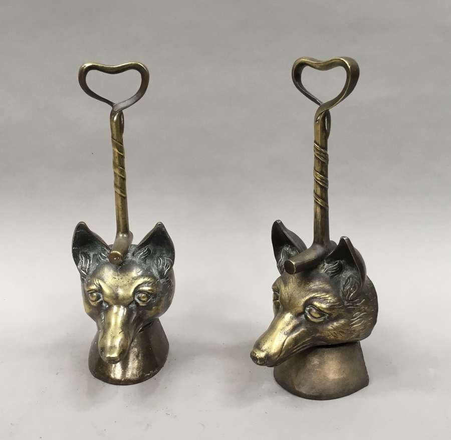 C19th matched pair of brass fox head doorstops / door porters