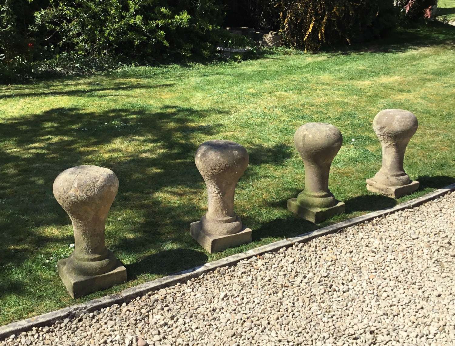 C19th set of four stone bollards / posts