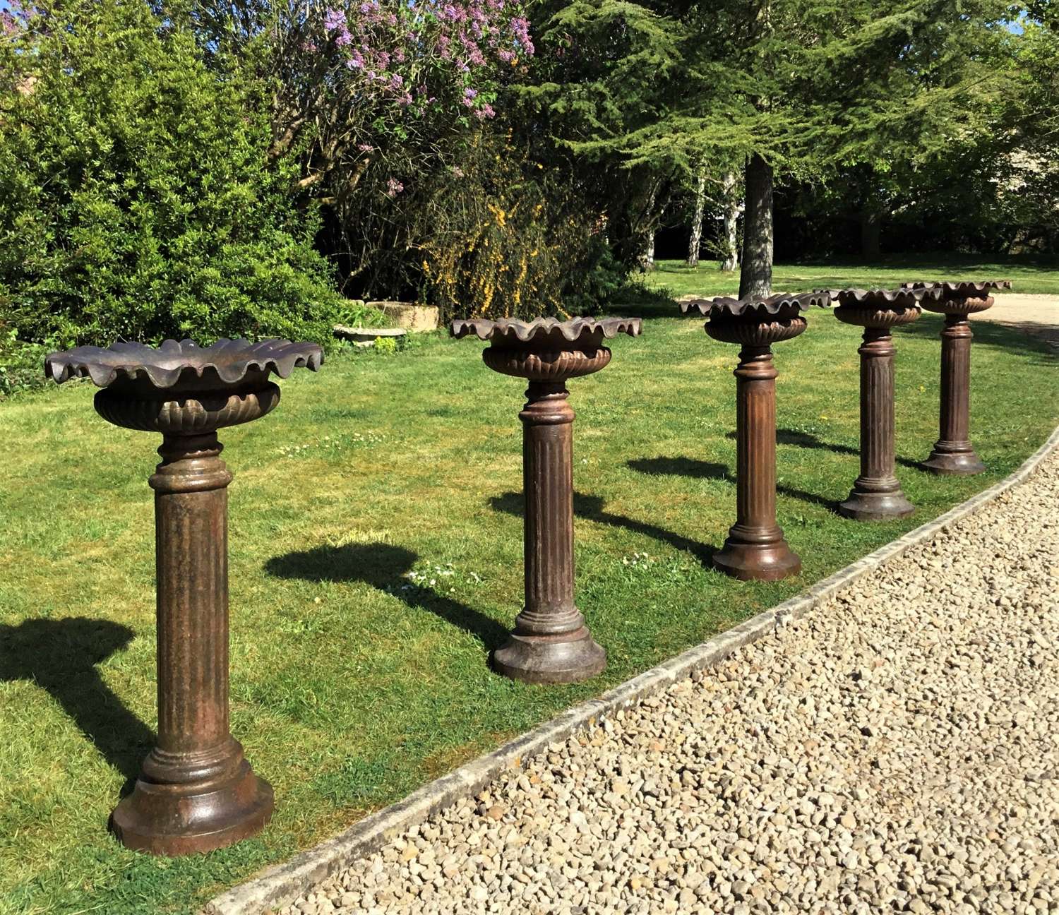 Late C19th set of 5 stylish cast iron garden urns / planters