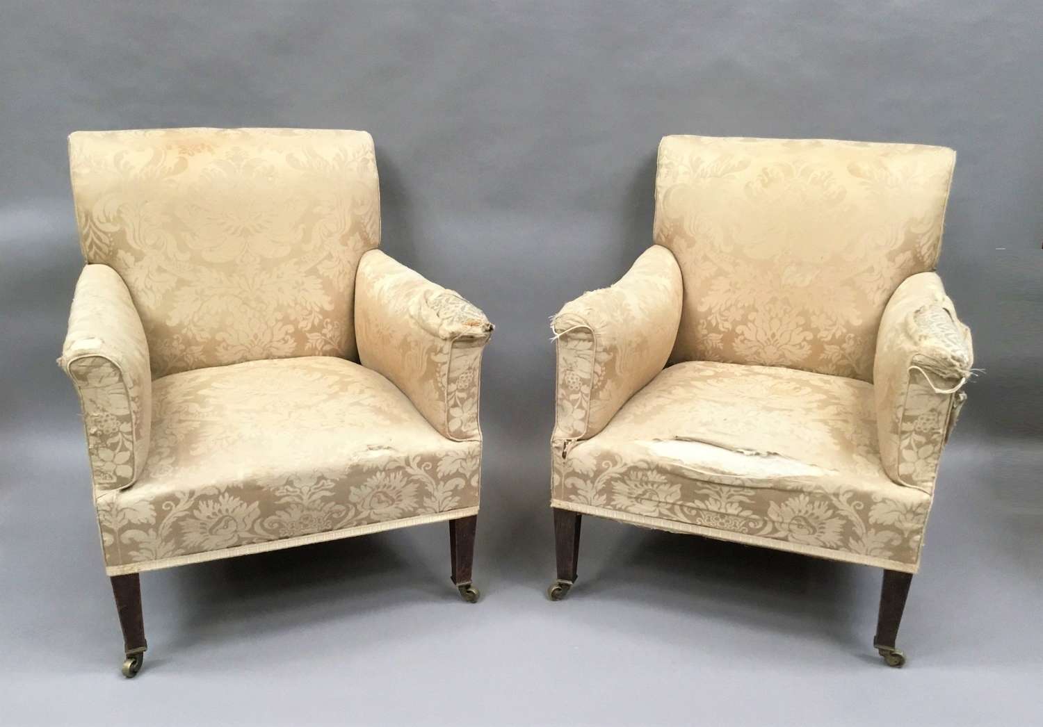 C19th Howard and Sons pair of upholstered library chairs / armchair