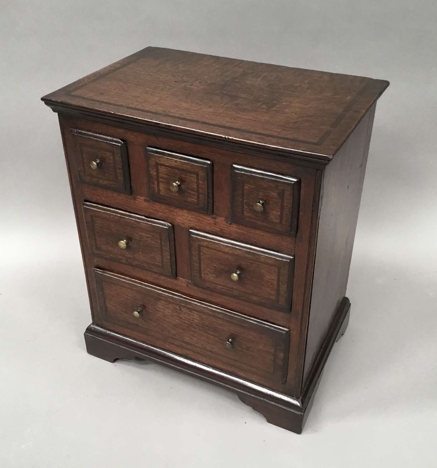 C18th miniature oak chest of drawers