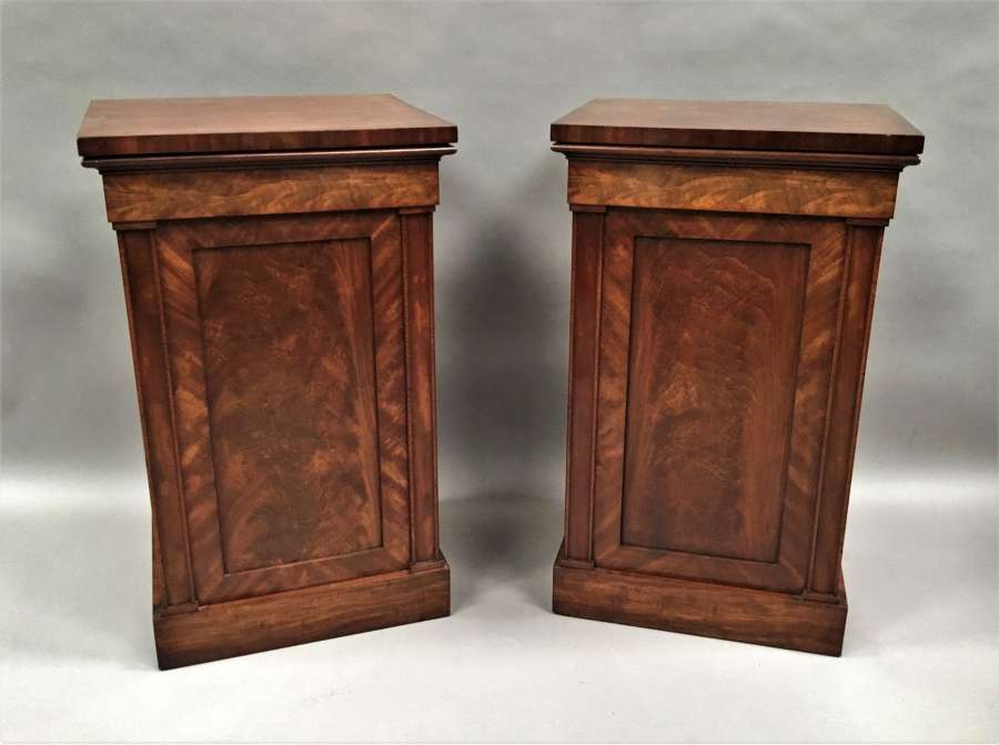Late Regency pair of mahogany pedestal cabinets