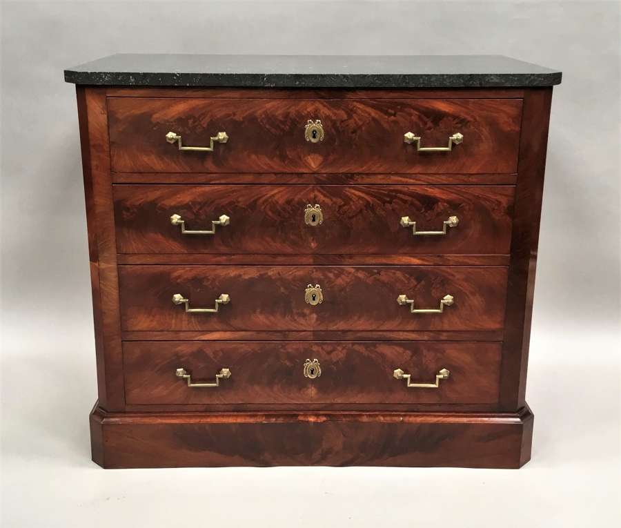 C19th French flame mahogany commode / chest of drawers