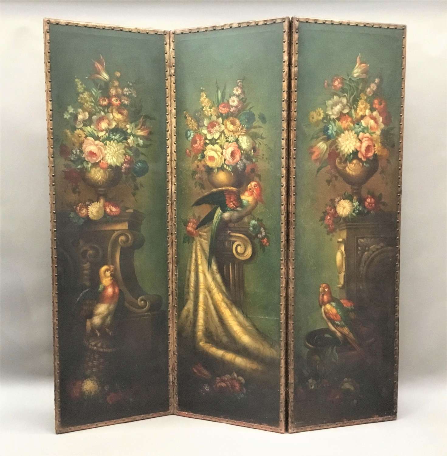 C19th painted leather three fold screen;