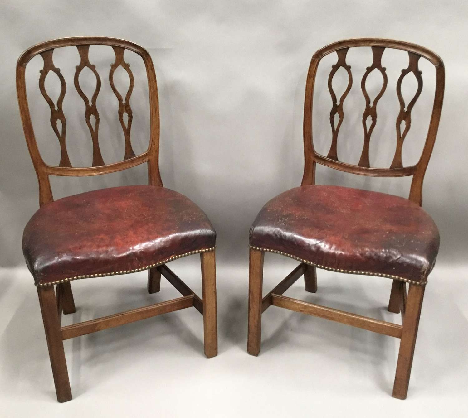 George III pair of mahogany and leather side chairs