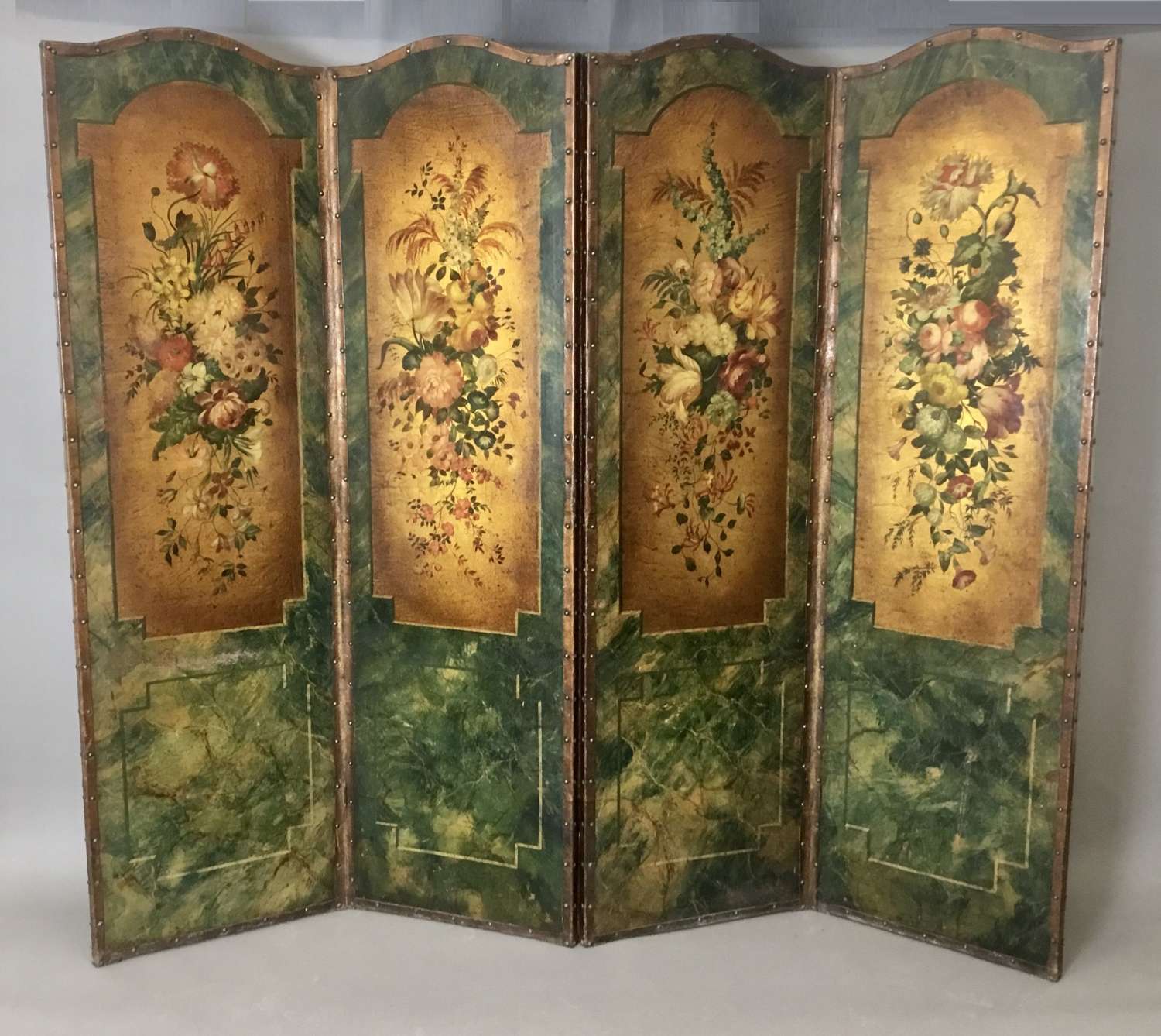 C19th painted leather four fold screen