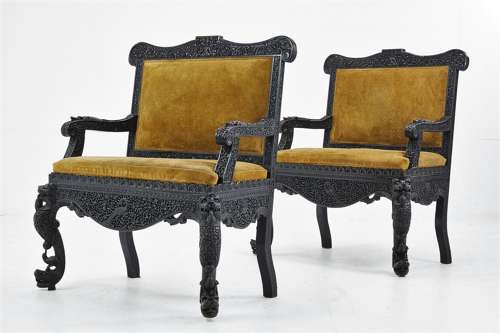 Extraordinary C19th pair of Indian carved hardwood chairs / hall seats