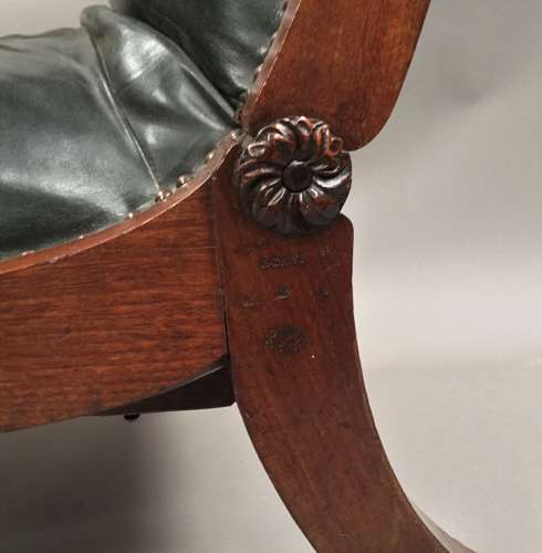 A significant late Regency mahogany and leather Daws library chair
