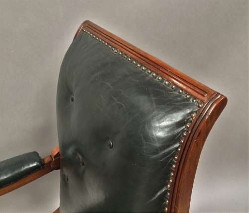 A significant late Regency mahogany and leather Daws library chair