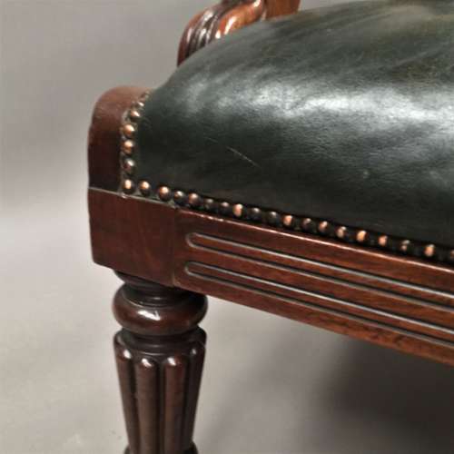 A significant late Regency mahogany and leather Daws library chair