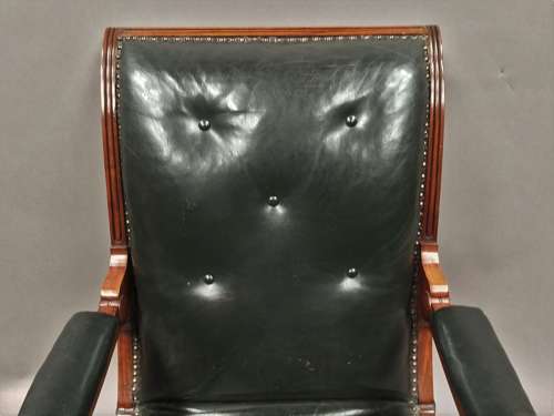 A significant late Regency mahogany and leather Daws library chair