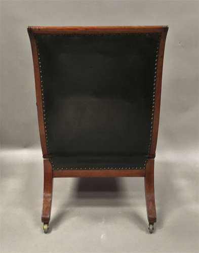 A significant late Regency mahogany and leather Daws library chair