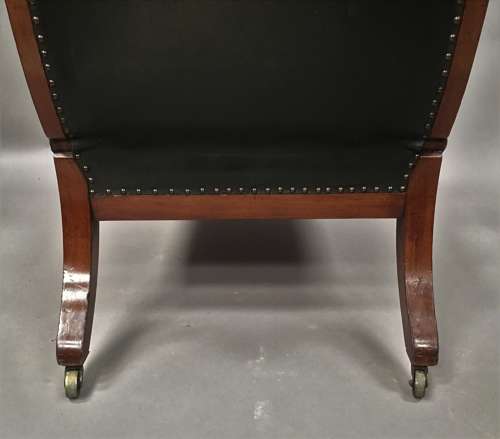 A significant late Regency mahogany and leather Daws library chair