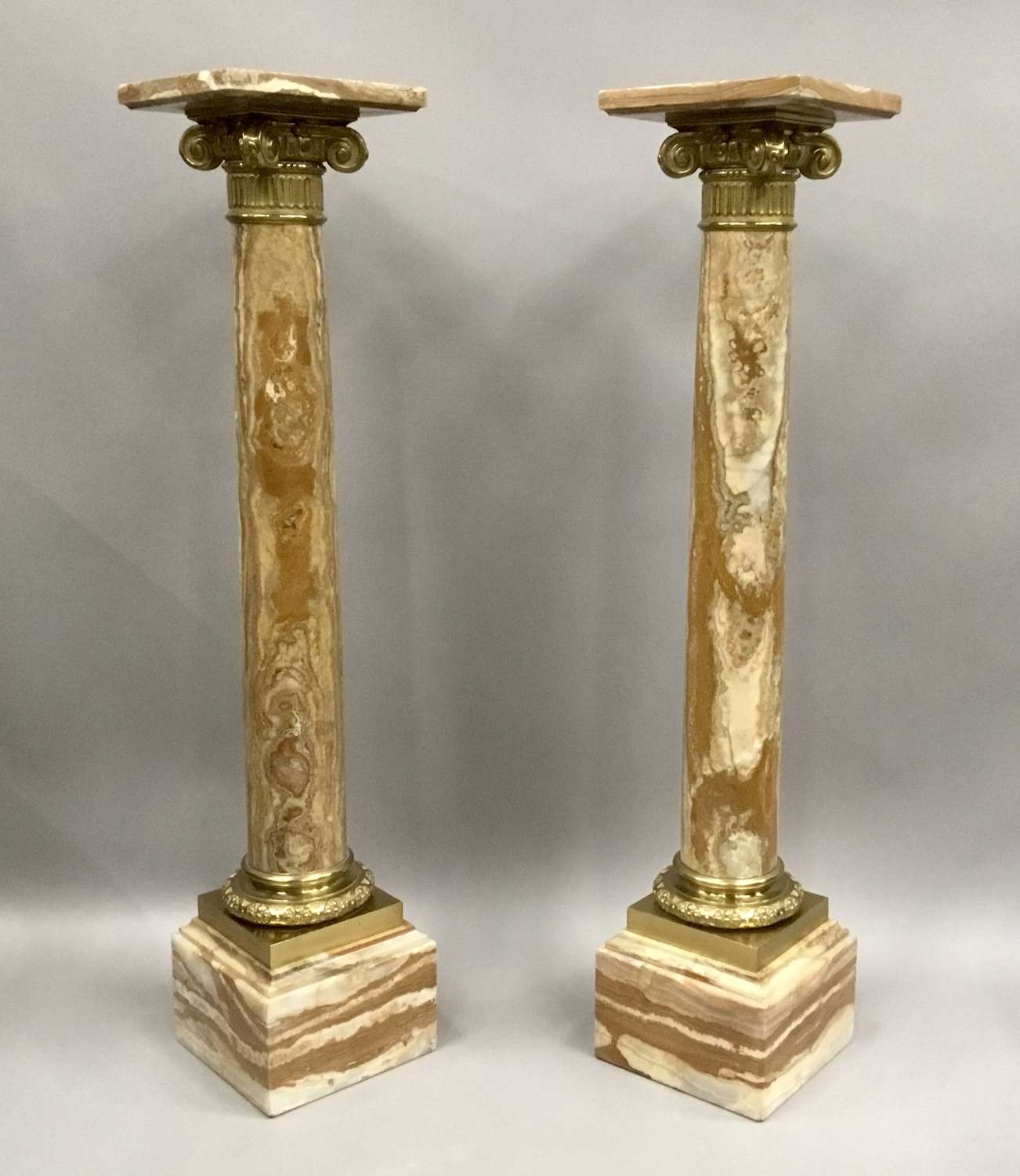 A splendid C19th pair of marble and ormolu pedestal columns