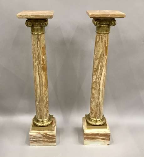 A splendid C19th pair of marble and ormolu pedestal columns