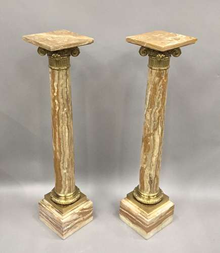 A splendid C19th pair of marble and ormolu pedestal columns