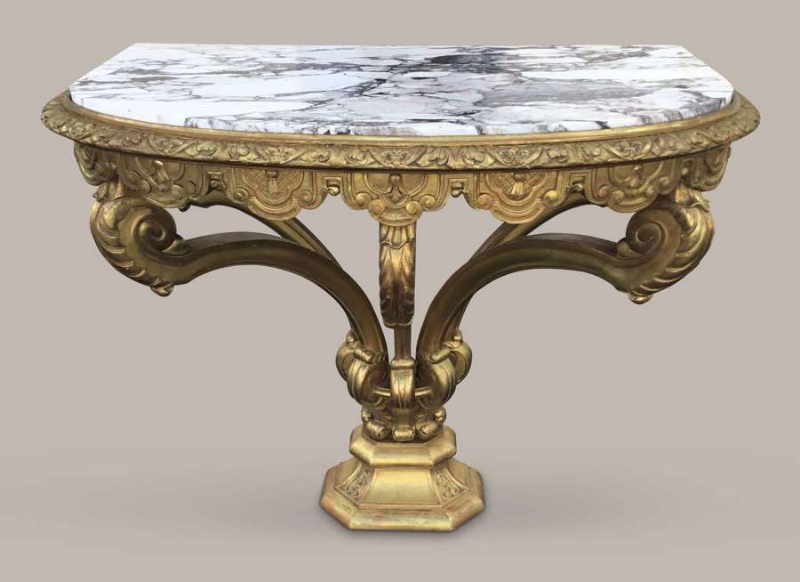 Impressive C19th carved giltwood console table in the Kentian manner