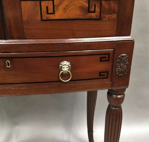 Good Regency mahogany bow fronted cabinet on stand