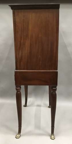 Good Regency mahogany bow fronted cabinet on stand