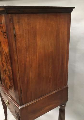 Good Regency mahogany bow fronted cabinet on stand