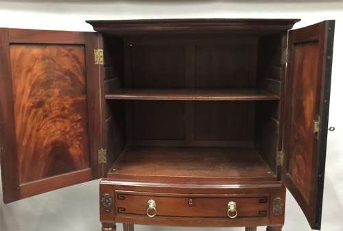 Good Regency mahogany bow fronted cabinet on stand