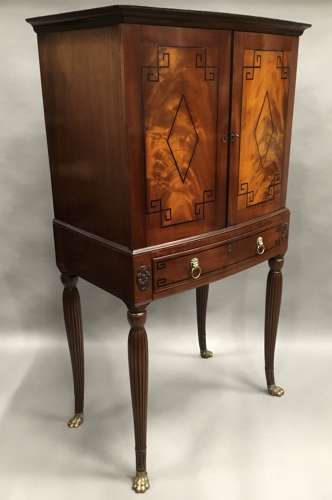 Good Regency mahogany bow fronted cabinet on stand
