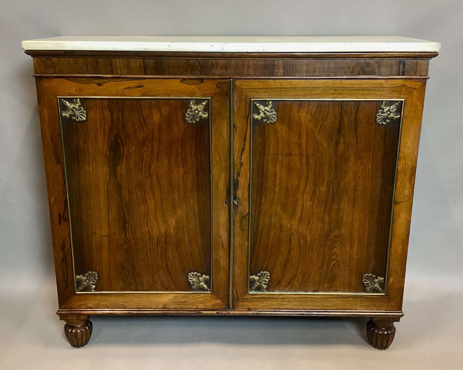 Good Regency rosewood and gilt brass side cabinet