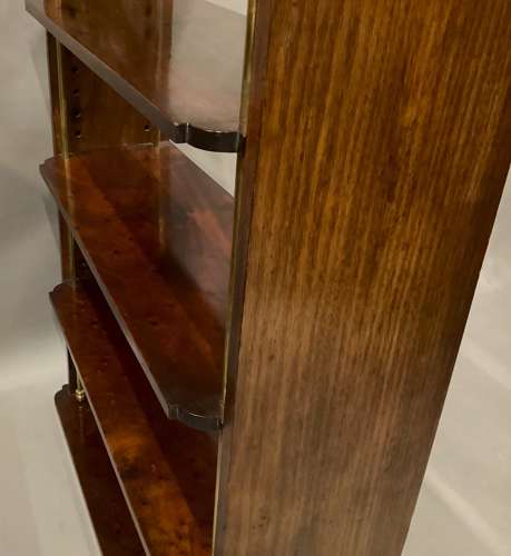 Good Regency mahogany and brass hanging wall shelves