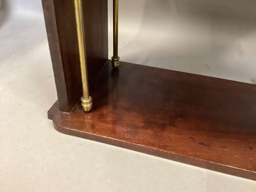 Good Regency mahogany and brass hanging wall shelves
