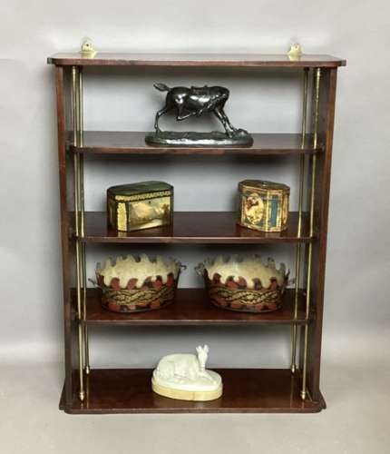 Good Regency mahogany and brass hanging wall shelves