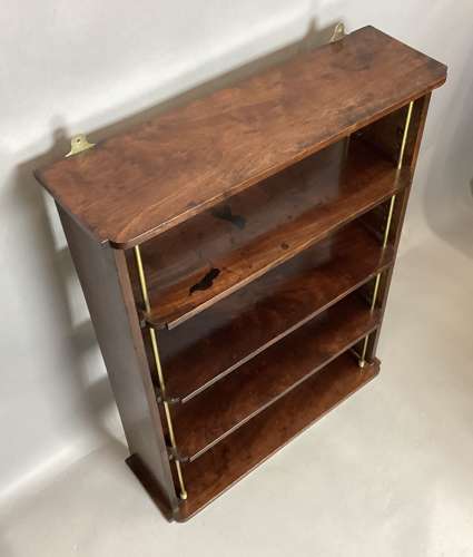 Good Regency mahogany and brass hanging wall shelves