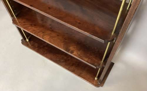 Good Regency mahogany and brass hanging wall shelves