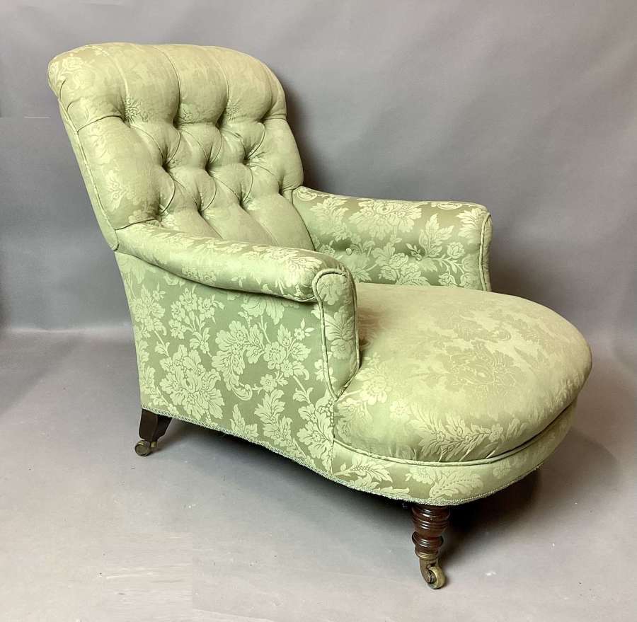 Good C19th Howard and Sons rare model upholstered armchair