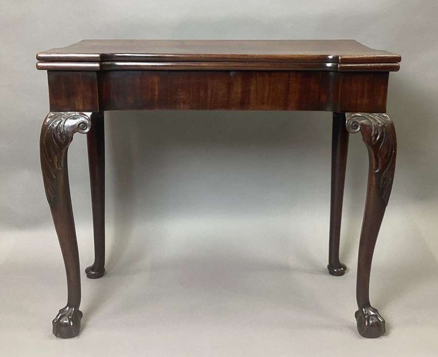 Handsome George II mahogany foldover top tea table